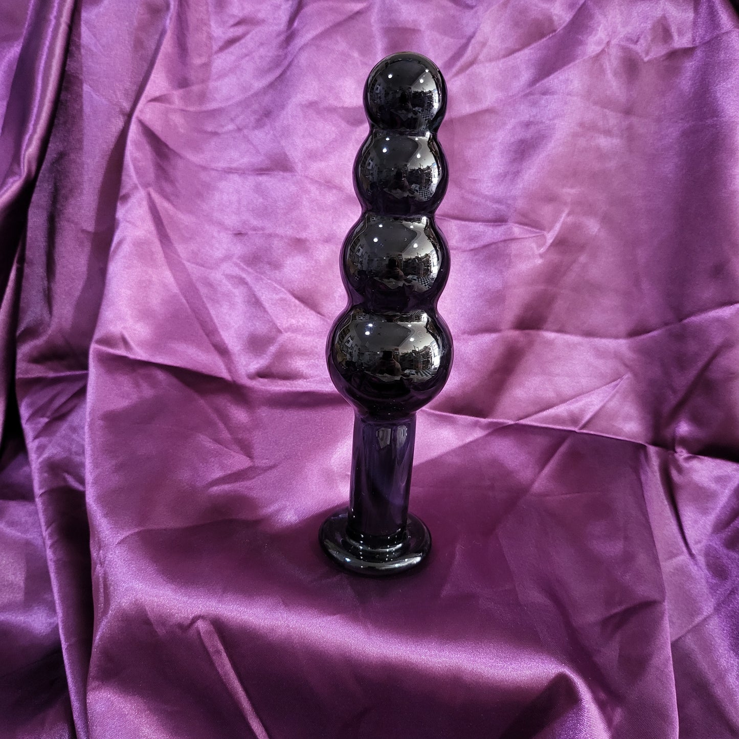 A Size Queen ~ blown glass butt plug